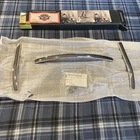 Harley Davidson 58312-95 Chrome Windshield Trim Oem Nos New. Price: $24.00.