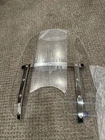 Memphis Slims 17 In. Clear Windshield W/7 Headlight Cutout New. Price: $169.99.