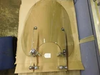 New Harley Davidson Quick Release Windshield Oem #57838-08. Price: $290.00.